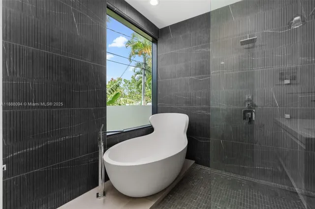 a bathroom with a shower and toilet