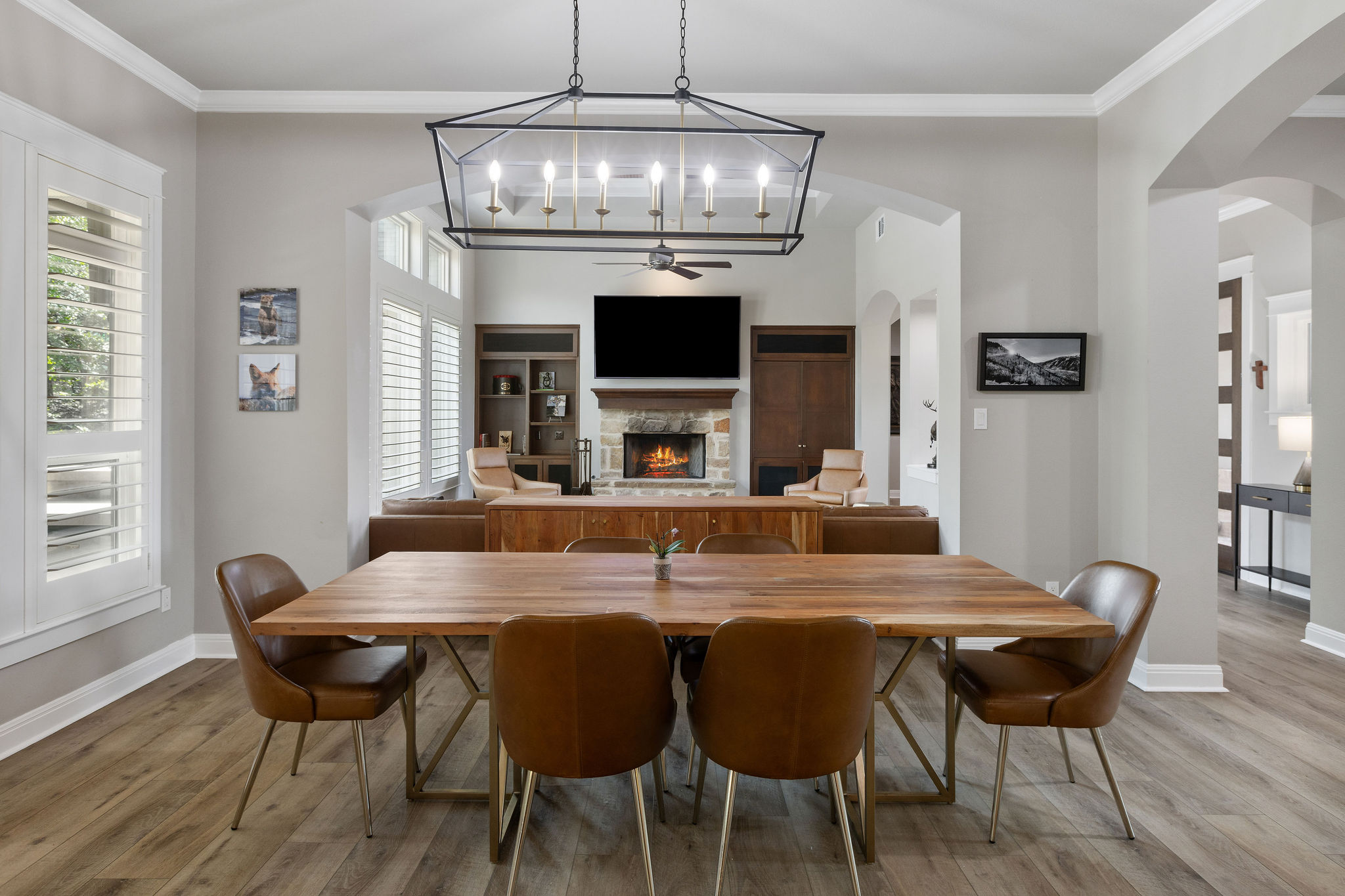 279 Rugged Earth Drive Austin, TX 78737 - Photo 14 of 40 a view of a dining room with furniture and wooden floor