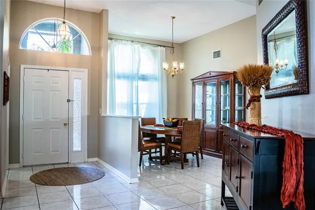 a view of a livingroom with furniture and window