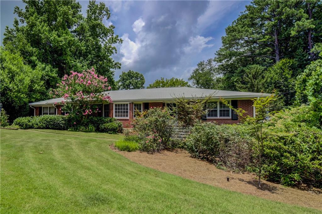 1424 Knollwood Terrace Decatur, GA 30033 - Photo 1 of 1 front view of a house with a yard