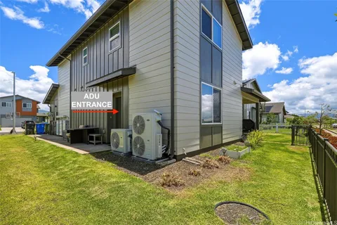 a view of a house with backyard