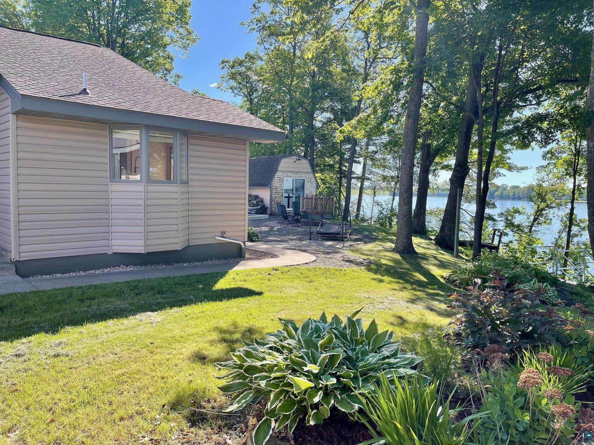 37460 Sunrise View Road Sturgeon Lake, MN 55783 - Photo 49 of 50 South side yard of house.