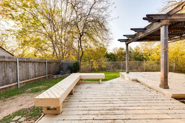 a view of a swimming pool with a patio