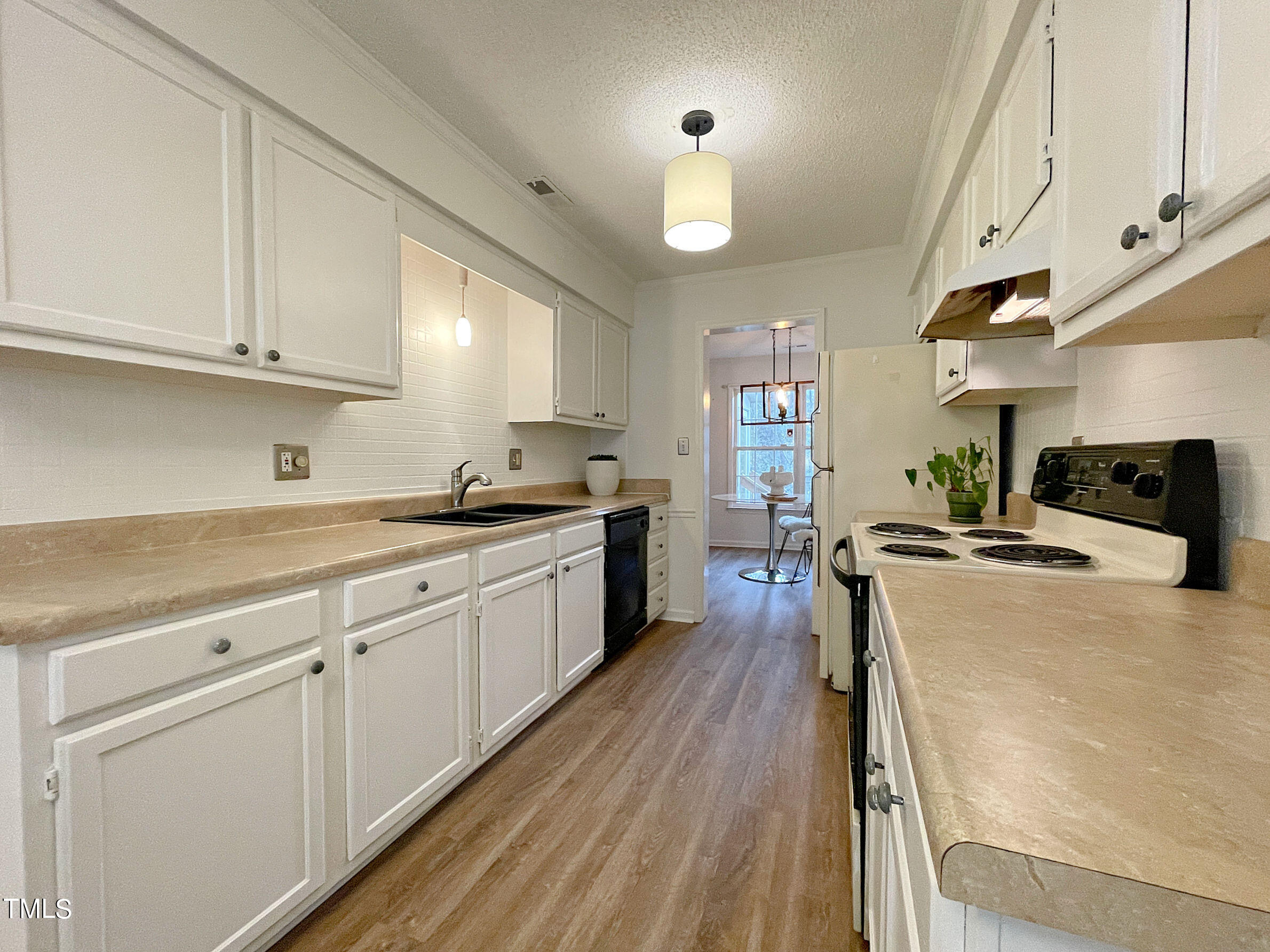 217 Wetherburn Lane Raleigh, NC 27615 - Photo 14 of 27 20240217_210410494_iOS