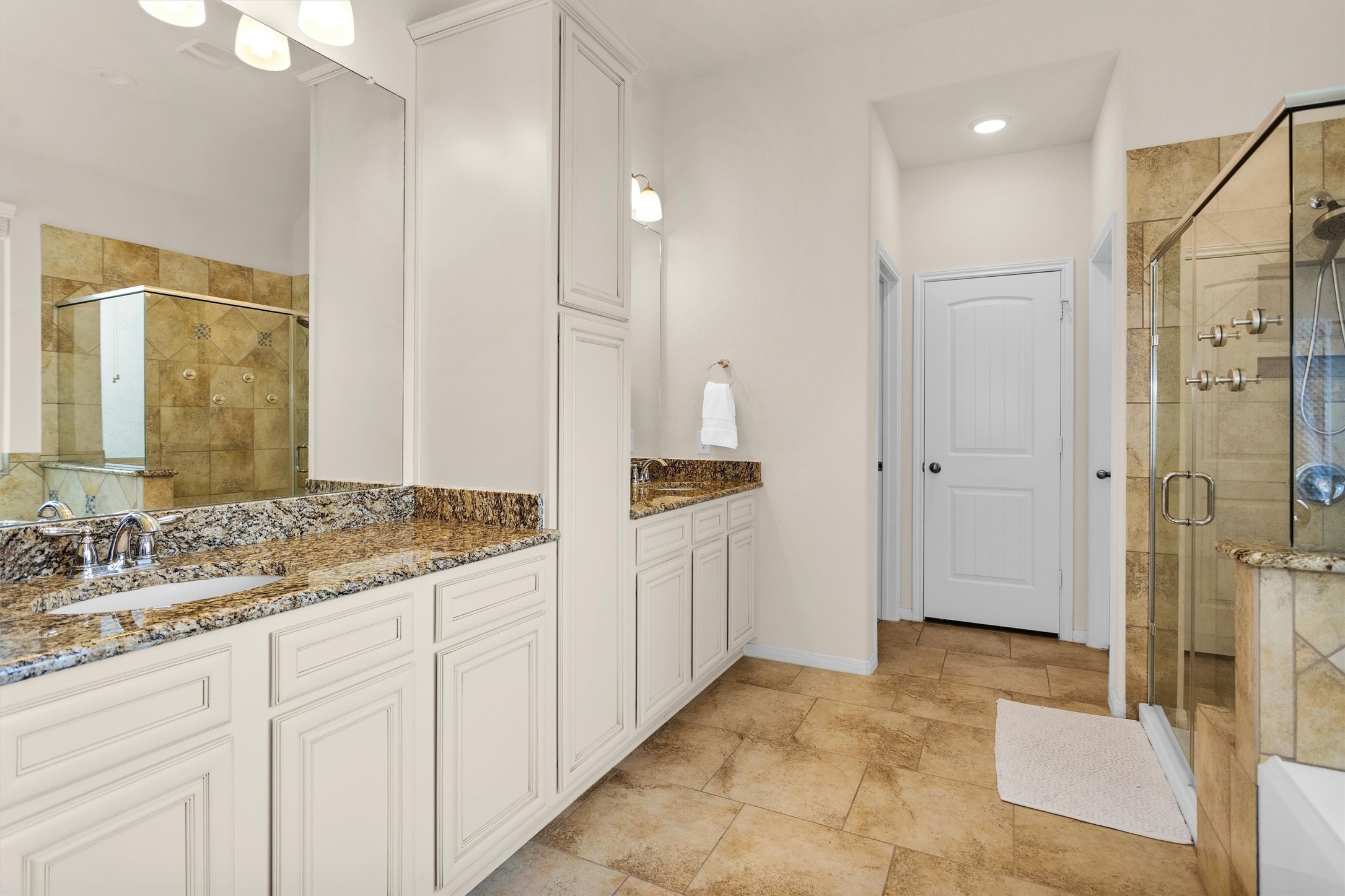 14105 Sun Notch Drive Conroe, TX 77384 - Photo 15 of 31 a bathroom with a granite countertop sink mirror and double