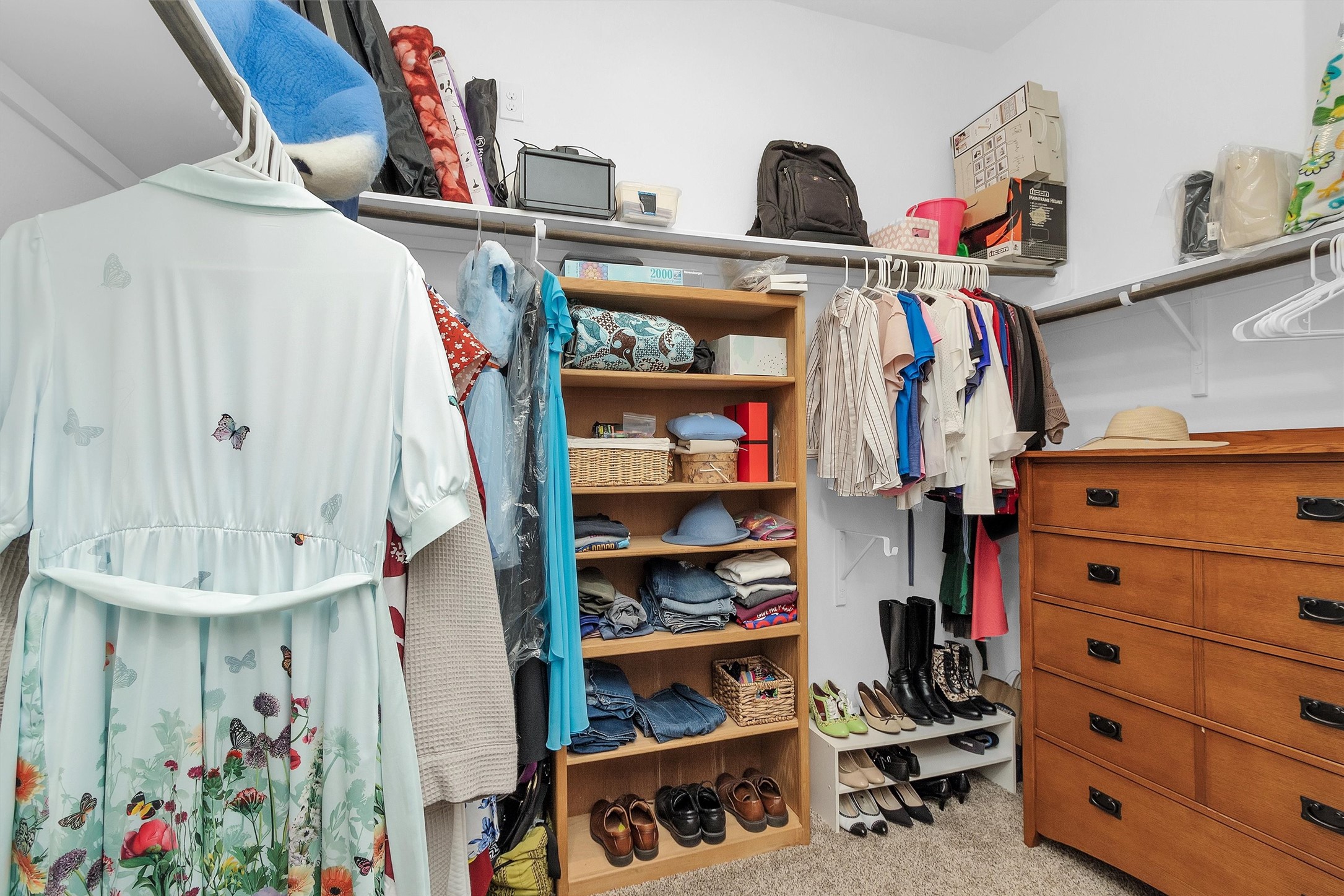 14105 Sun Notch Drive Conroe, TX 77384 - Photo 17 of 31 a view of walk in closet with clothes and shoes