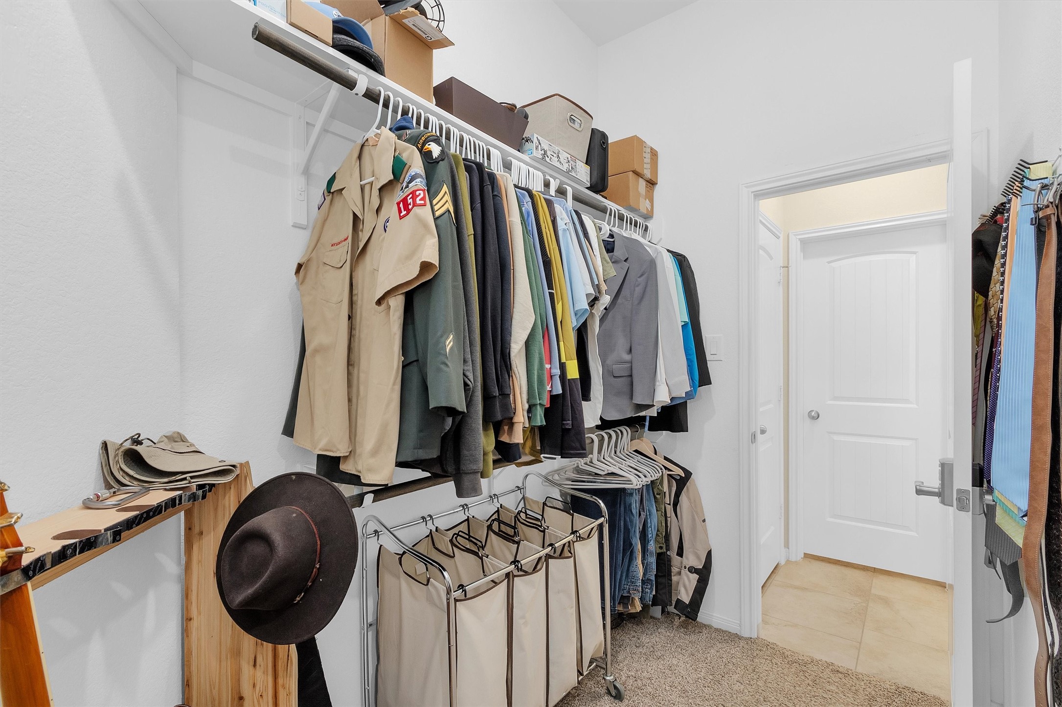 14105 Sun Notch Drive Conroe, TX 77384 - Photo 19 of 31 a view of walk in closet with clothes
