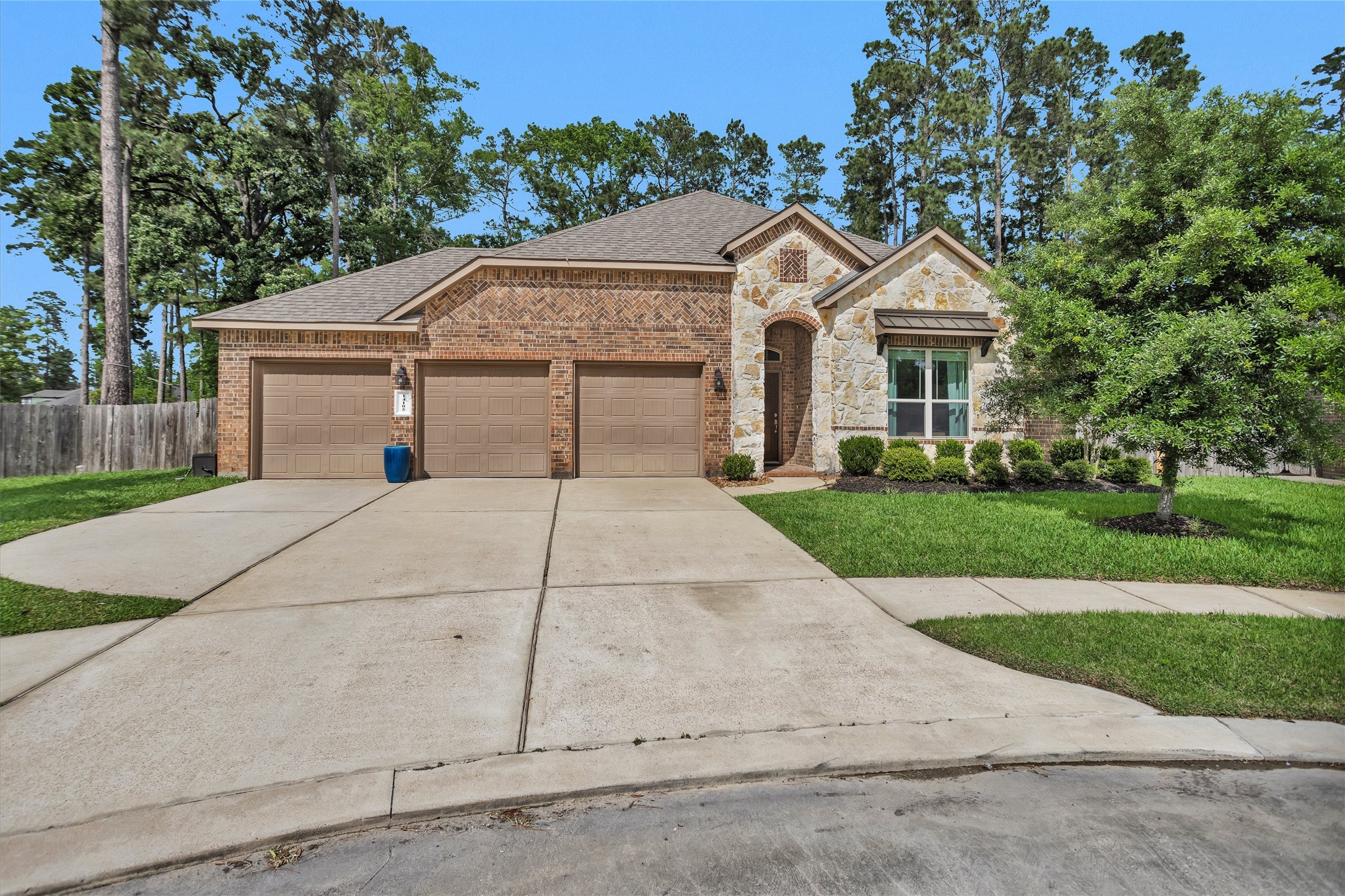 14105 Sun Notch Drive Conroe, TX 77384 - Photo 2 of 31 a view of house with garden