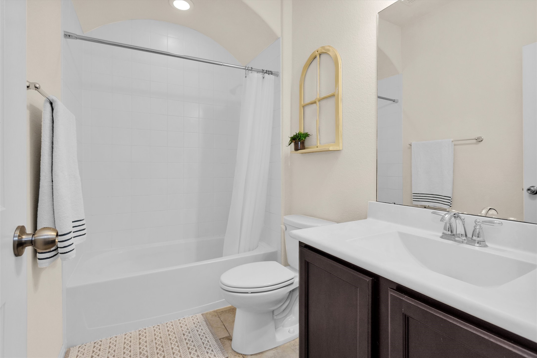 14105 Sun Notch Drive Conroe, TX 77384 - Photo 21 of 31 a bathroom with a sink a toilet and shower