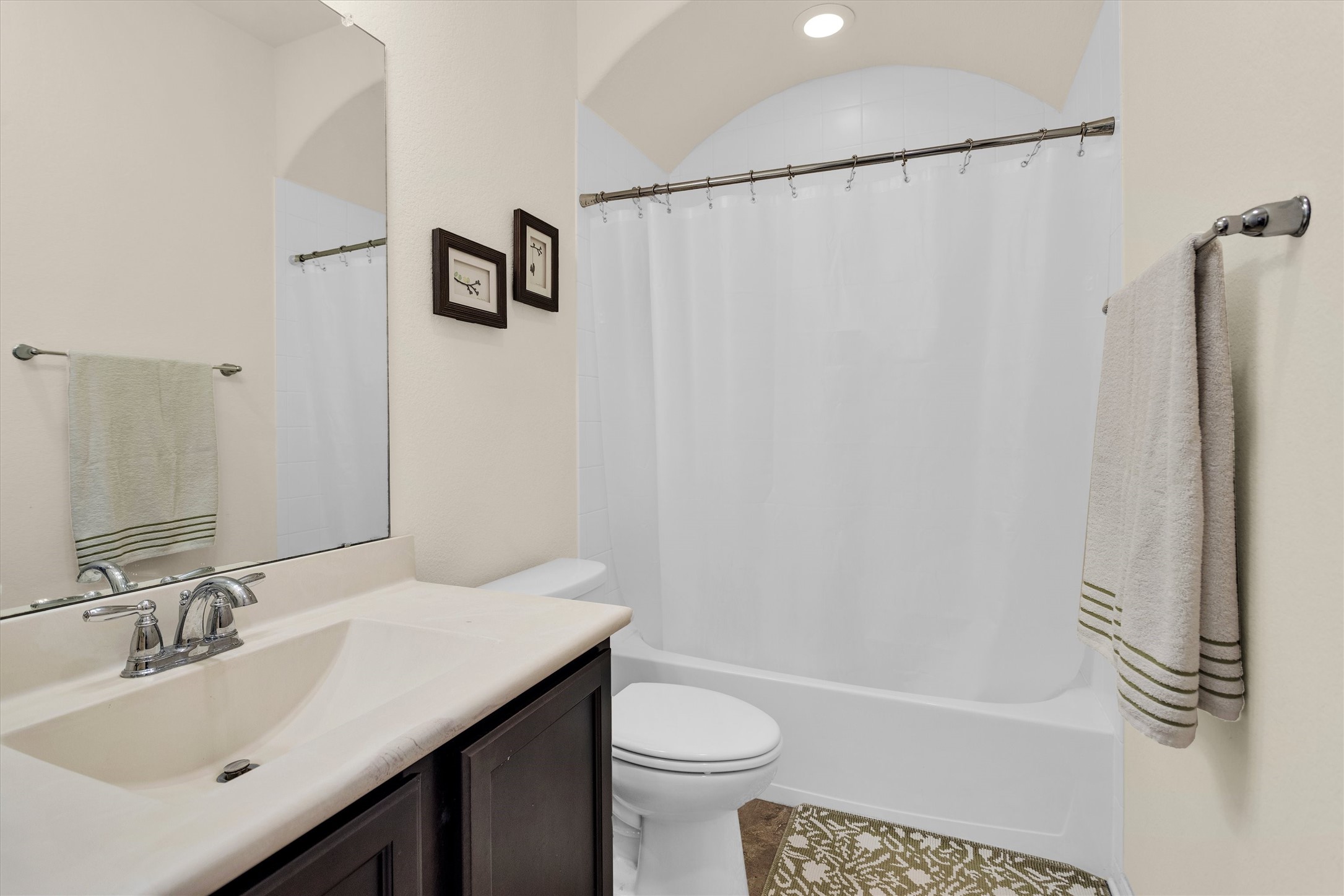 14105 Sun Notch Drive Conroe, TX 77384 - Photo 22 of 31 a bathroom with a sink a toilet and shower