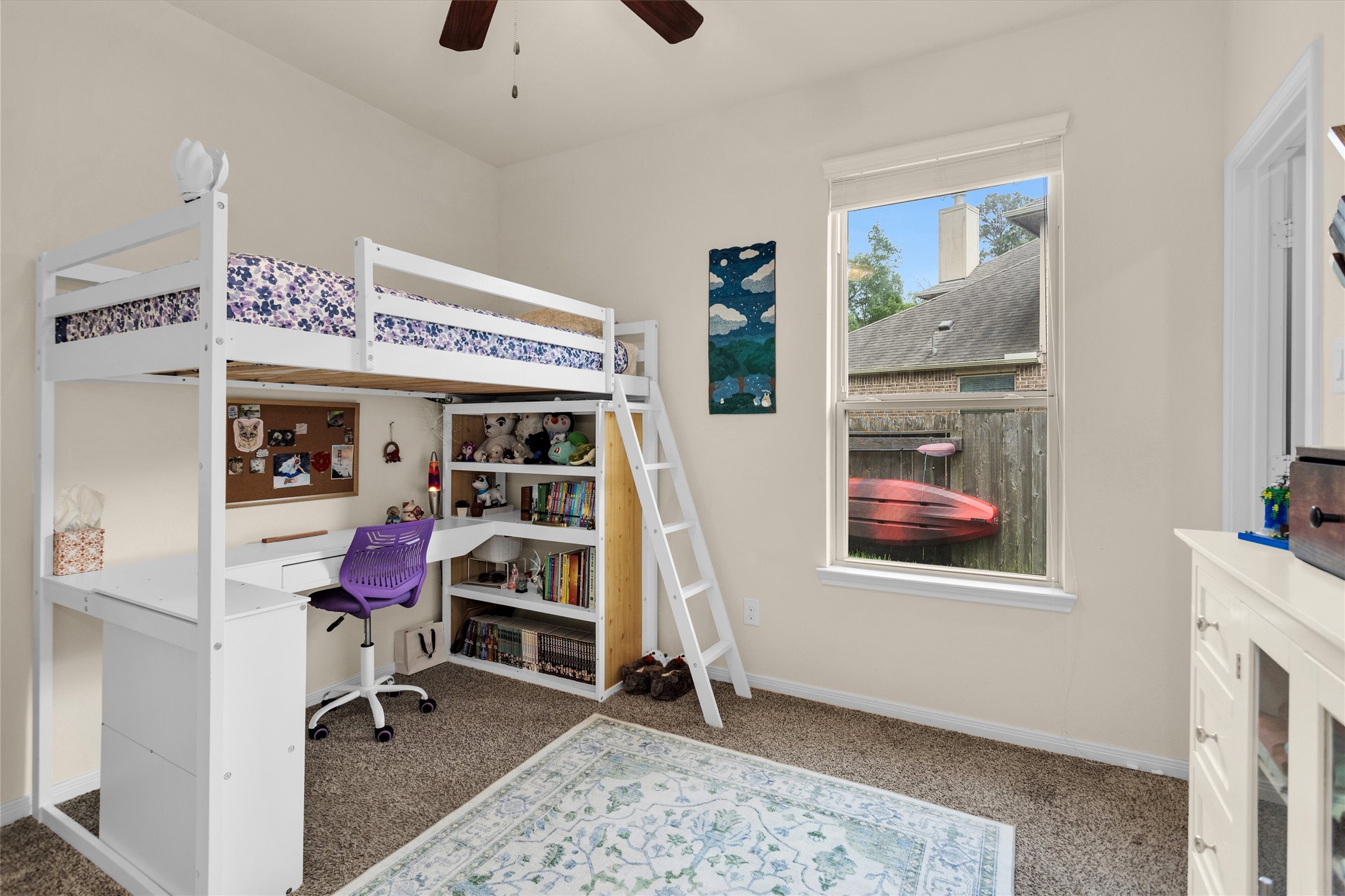 14105 Sun Notch Drive Conroe, TX 77384 - Photo 23 of 31 a view of a workspace with furniture and a window
