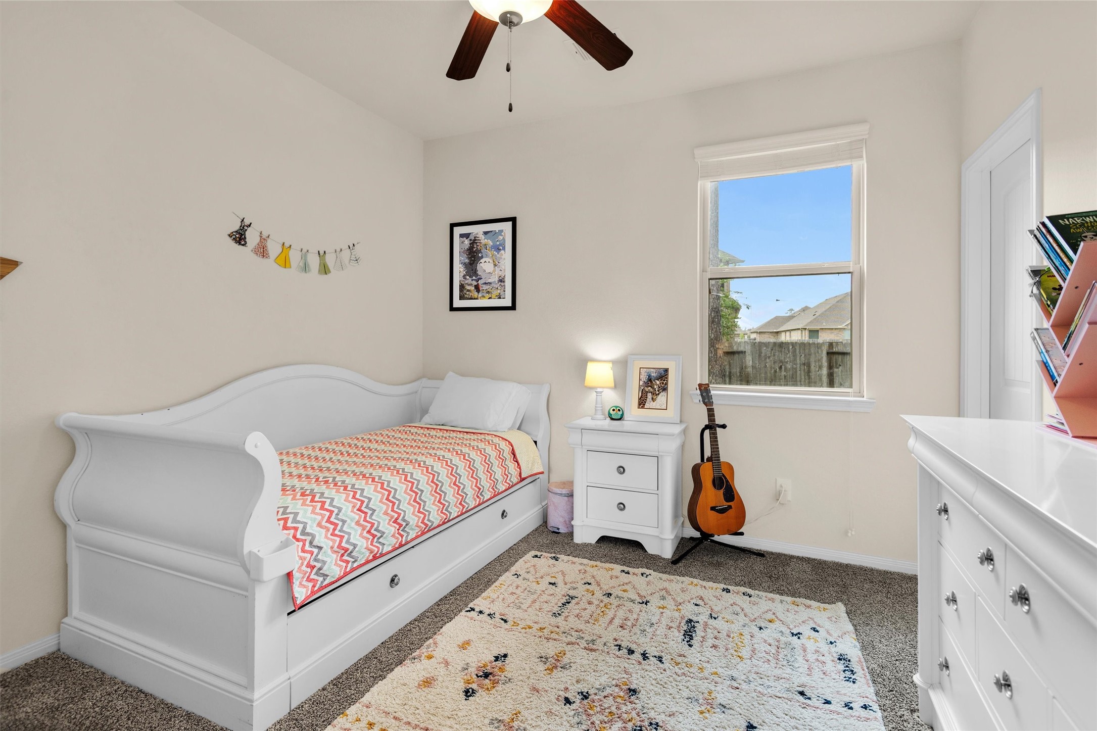 14105 Sun Notch Drive Conroe, TX 77384 - Photo 24 of 31 a bed room with a bed and a window