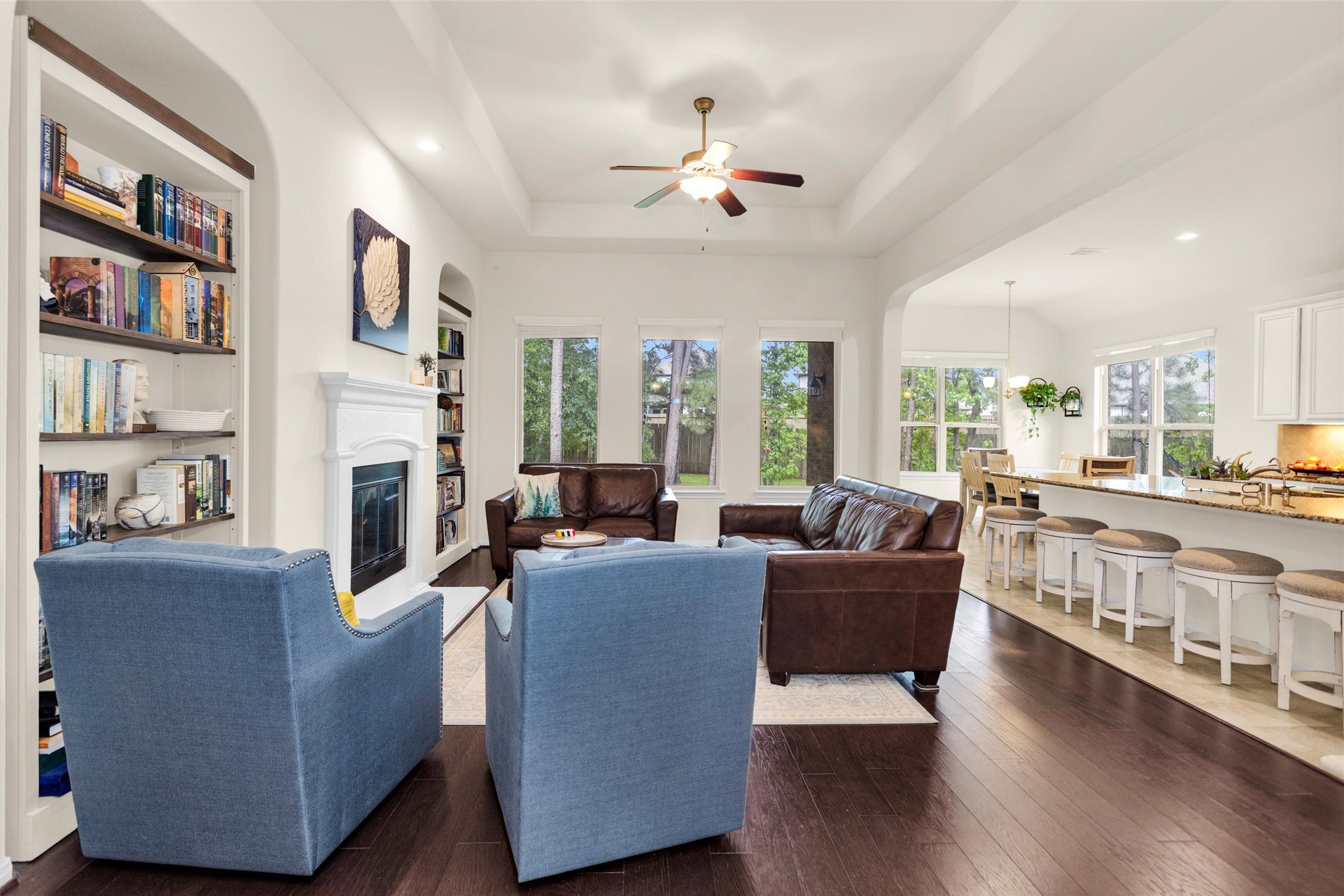 14105 Sun Notch Drive Conroe, TX 77384 - Photo 5 of 31 a living room with furniture and a fireplace