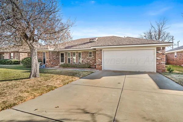 front view of house with a yard