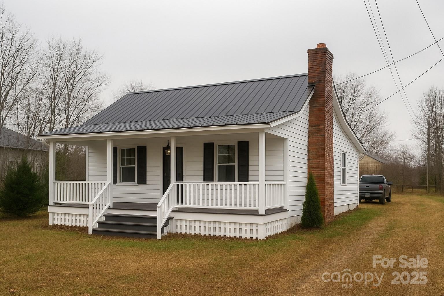 190 Cedar Valley Road Hudson, NC 28638 - Photo 2 of 12 a view of a house with a wooden fence