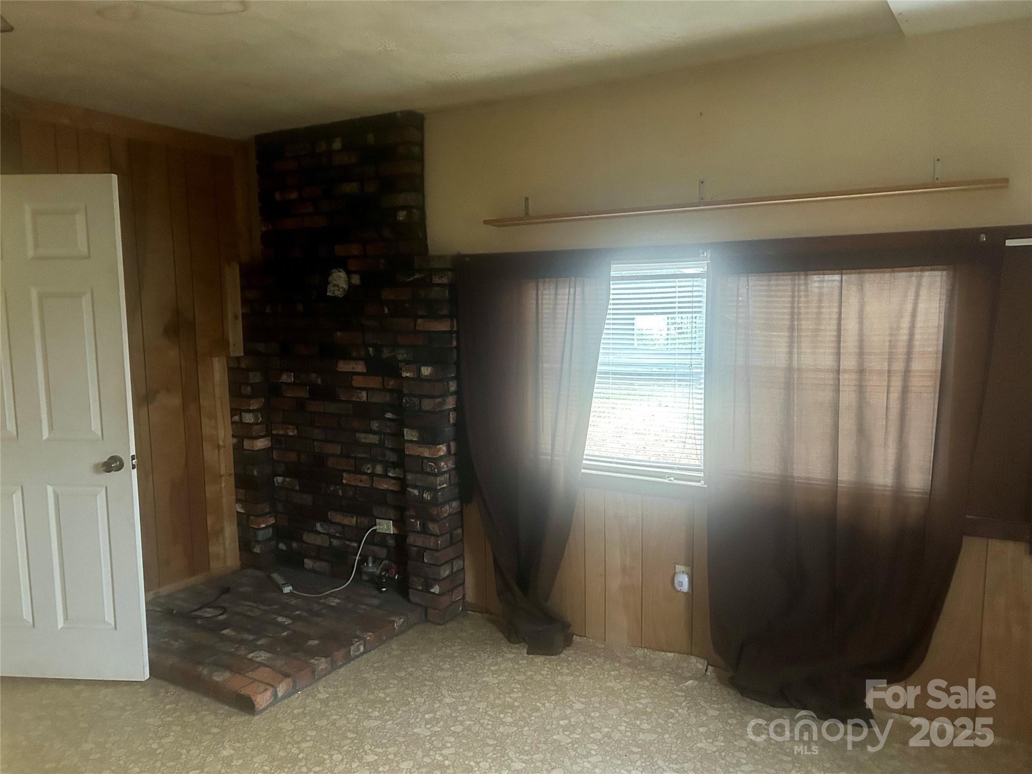 190 Cedar Valley Road Hudson, NC 28638 - Photo 9 of 12 an empty room with windows