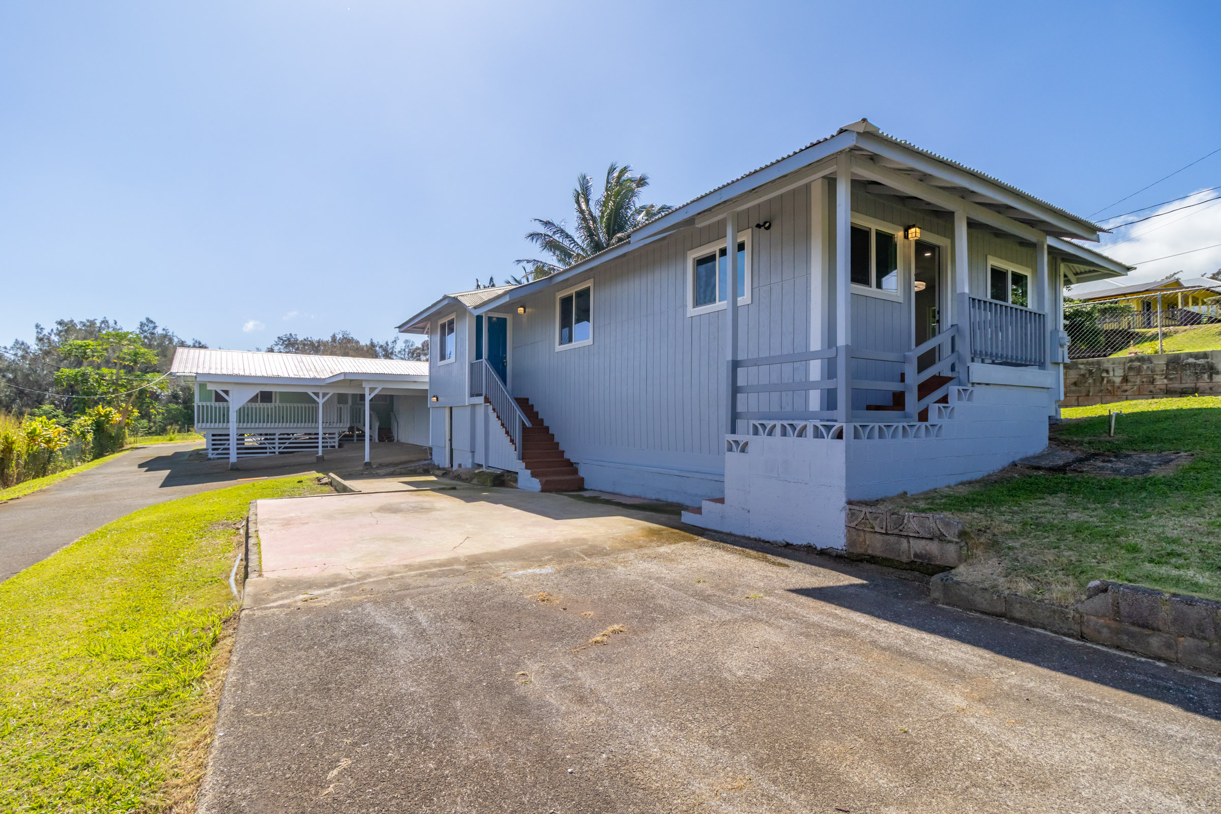 54-2378 Kynnersley Road Kapaau, HI 96755 - Photo 1 of 24 a front view of a house with a yard