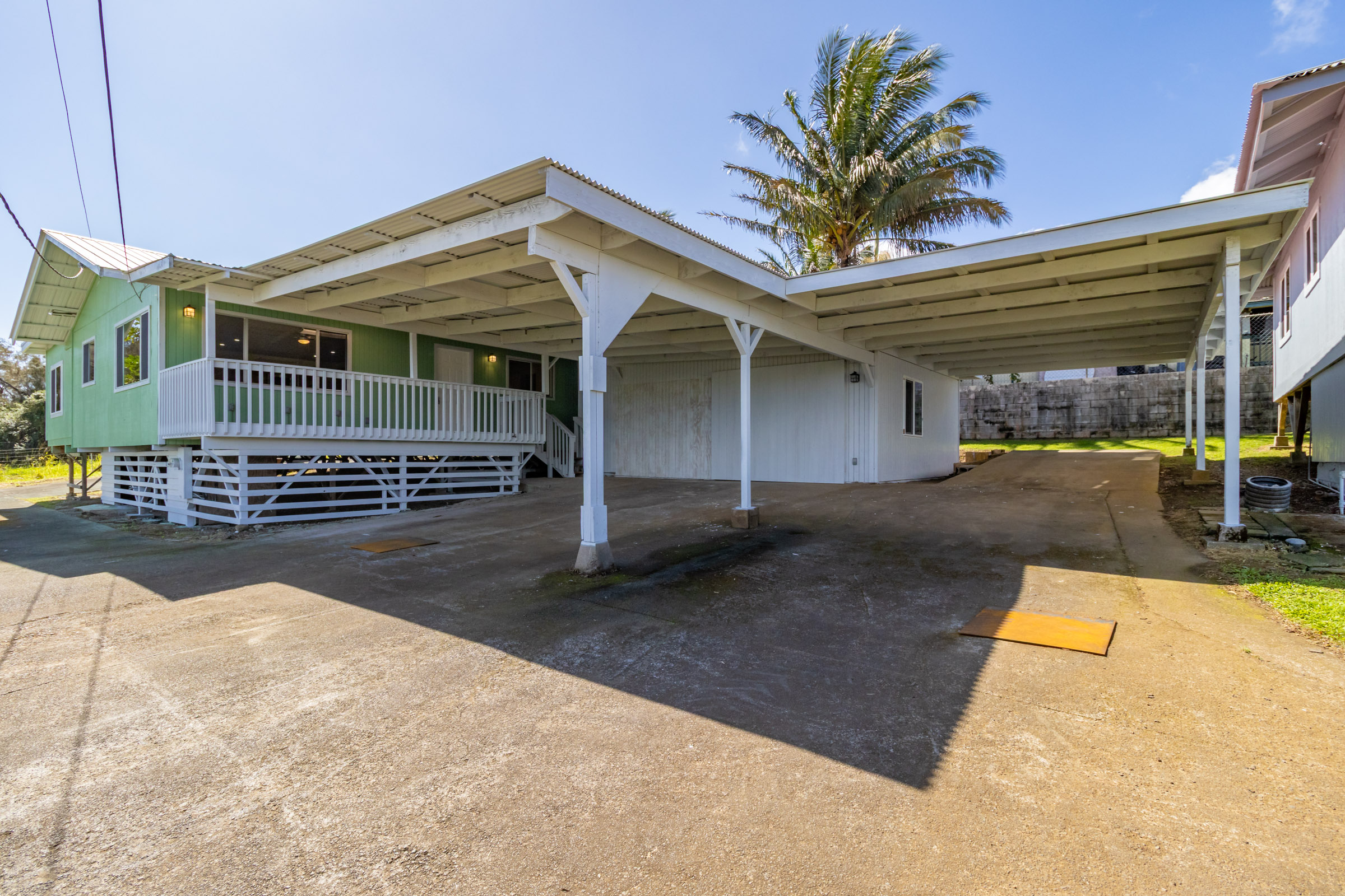 54-2378 Kynnersley Road Kapaau, HI 96755 - Photo 14 of 24 a view of a house with a patio