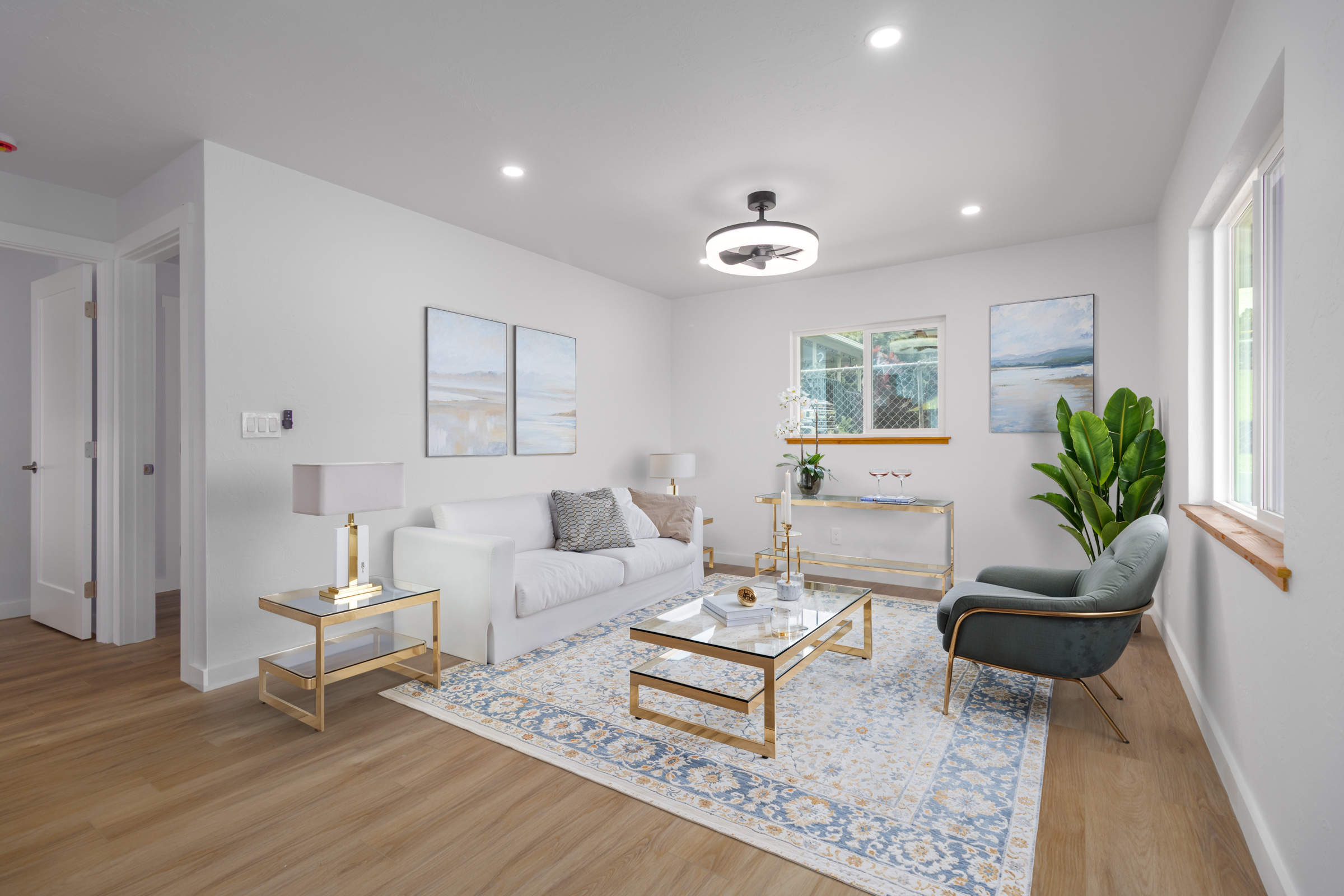 54-2378 Kynnersley Road Kapaau, HI 96755 - Photo 5 of 24 a living room with furniture and a potted plant