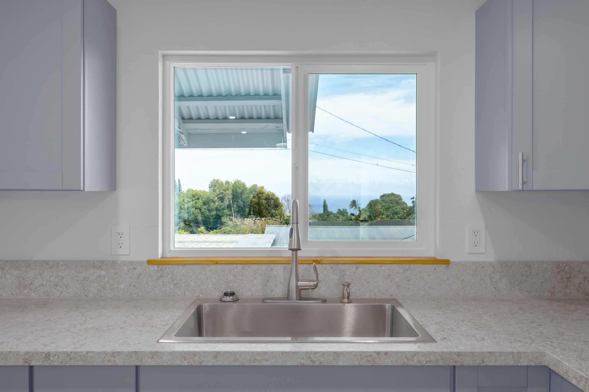 54-2378 Kynnersley Road Kapaau, HI 96755 - Photo 7 of 24 a kitchen sink with a next to a window