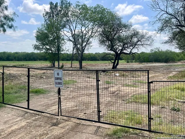 a view of a wrought iron fence