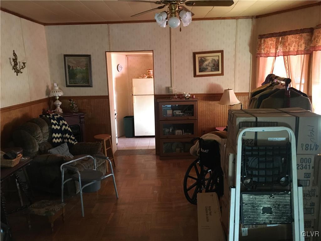 1247 Jackson Street Easton, PA 18042 - Photo 10 of 30 a living room with furniture and a flat screen tv