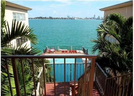 a view of a balcony with lake view