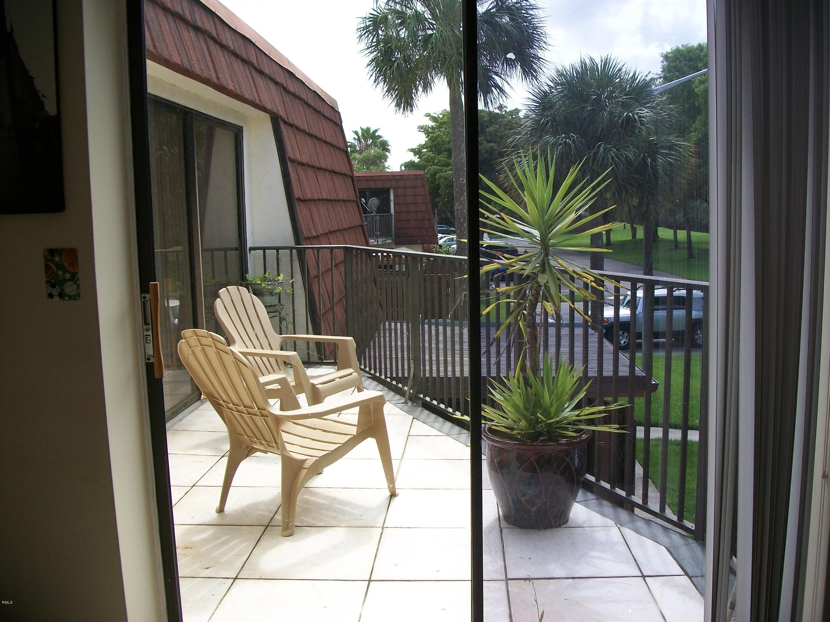 8229 Boca Rio Drive Boca Raton, FL 33433 - Photo 6 of 14 Multi-entrance balcony