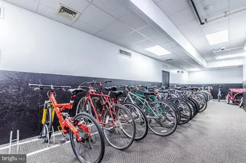 a view of a bike storage and utility room