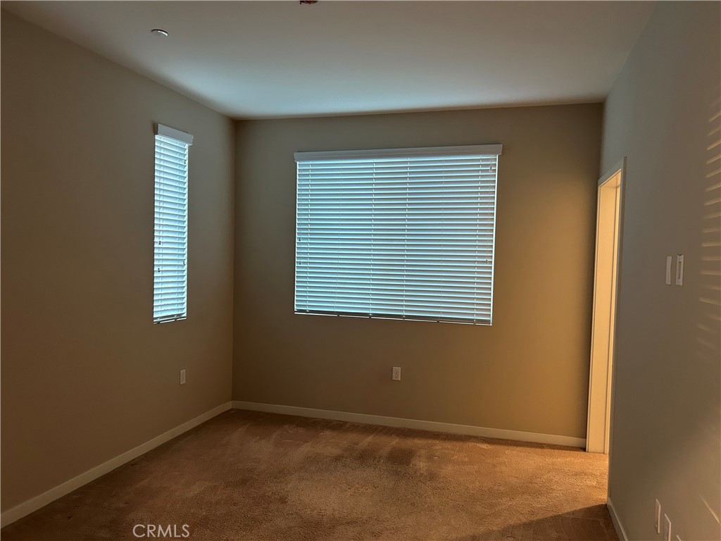 202 Tribeca Irvine, CA 92612 - Photo 11 of 21 an empty room with a window