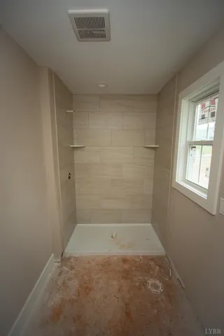 a view of an empty walk in closet