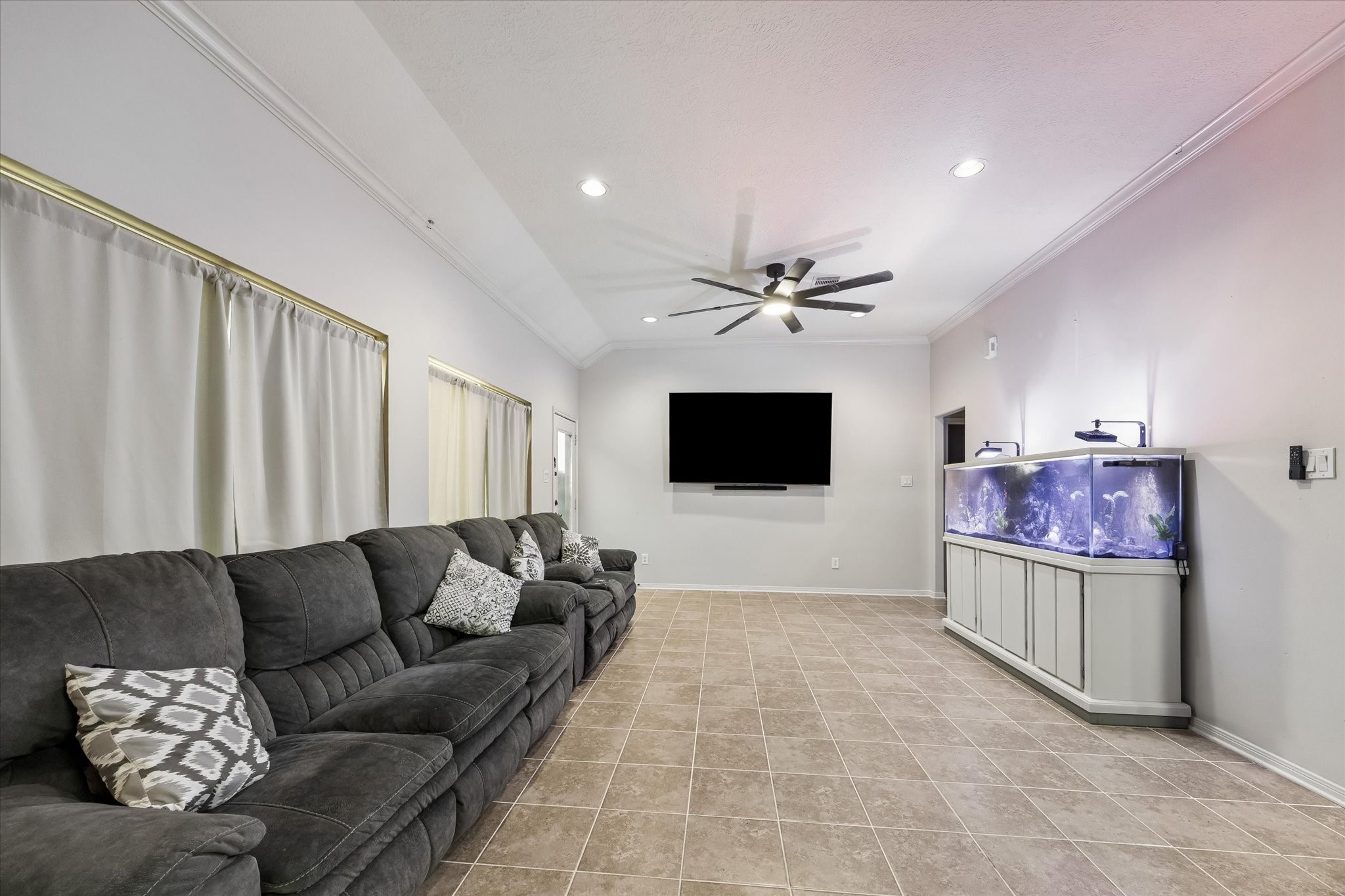1741 Eagle Lake Road Sealy, TX 77474 - Photo 2 of 15 a living room with furniture and a flat screen tv