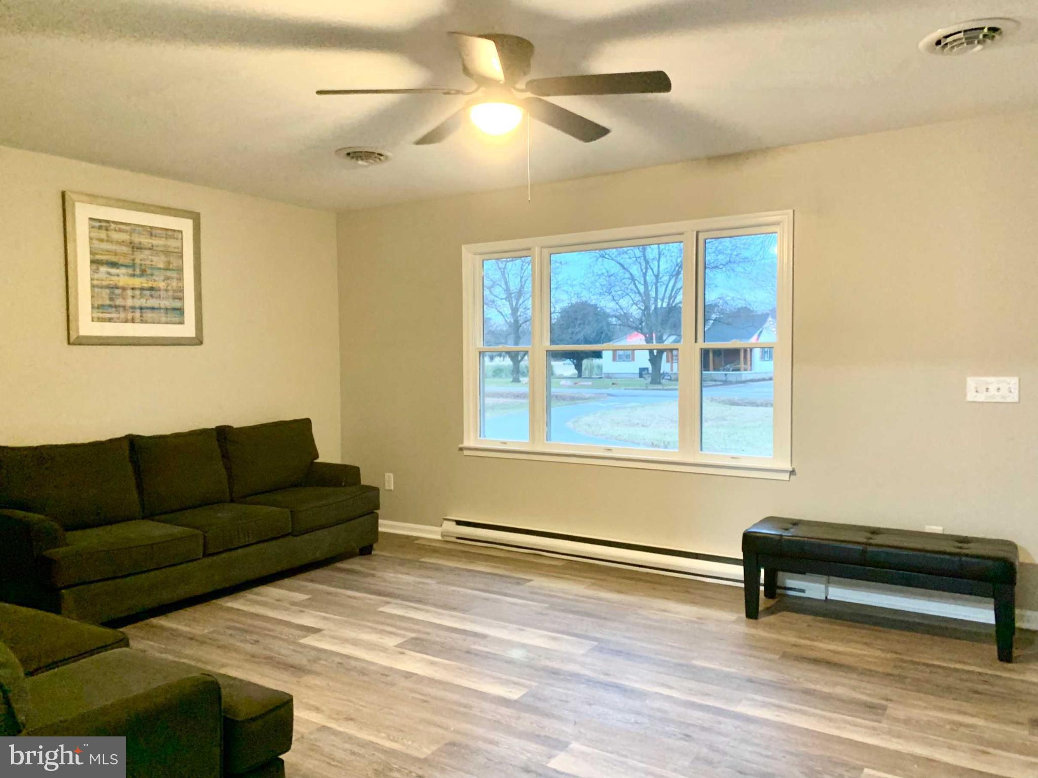 34121 Shockley Town Road Frankford, DE 19945 - Photo 6 of 14 a living room with furniture and a window