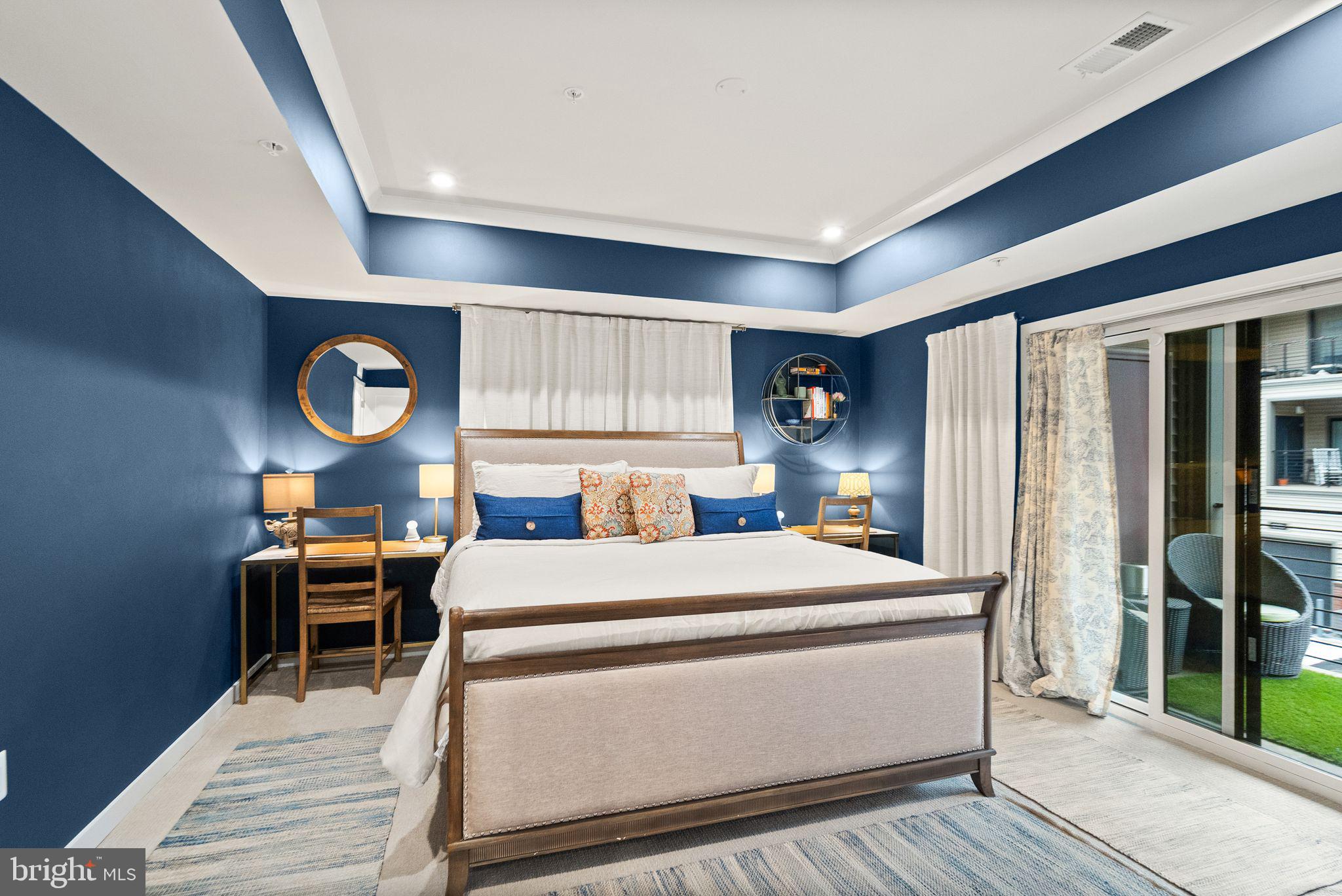 43553 Charitable Street Ashburn, VA 20148 - Photo 25 of 63 a room with a bed and a table in it