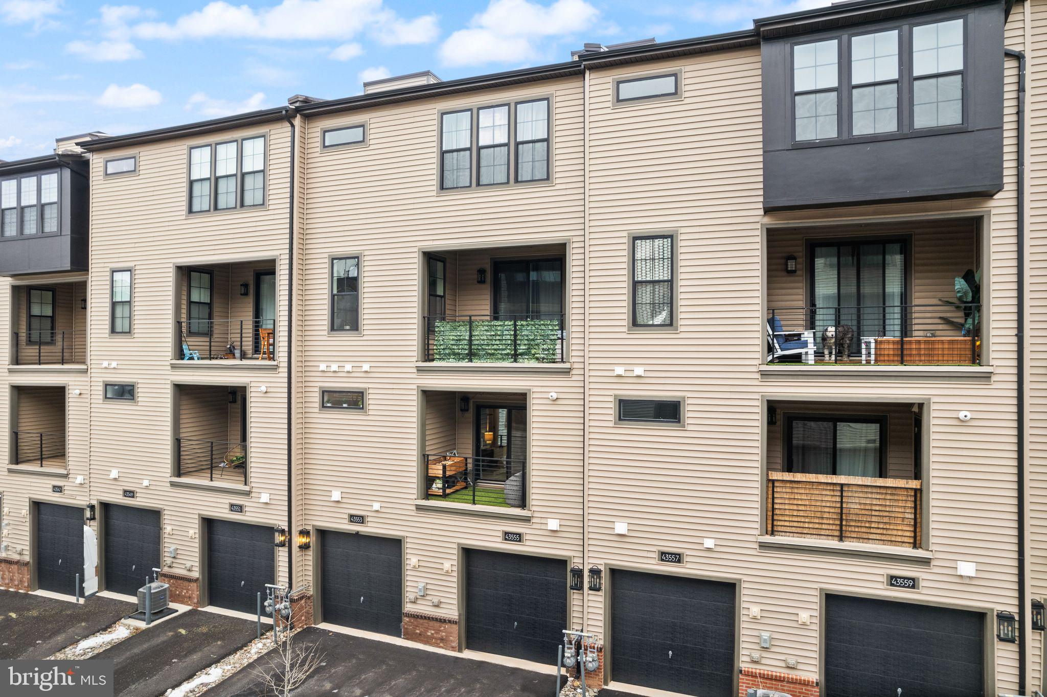 43553 Charitable Street Ashburn, VA 20148 - Photo 48 of 63 a view of a house with a window and balcony