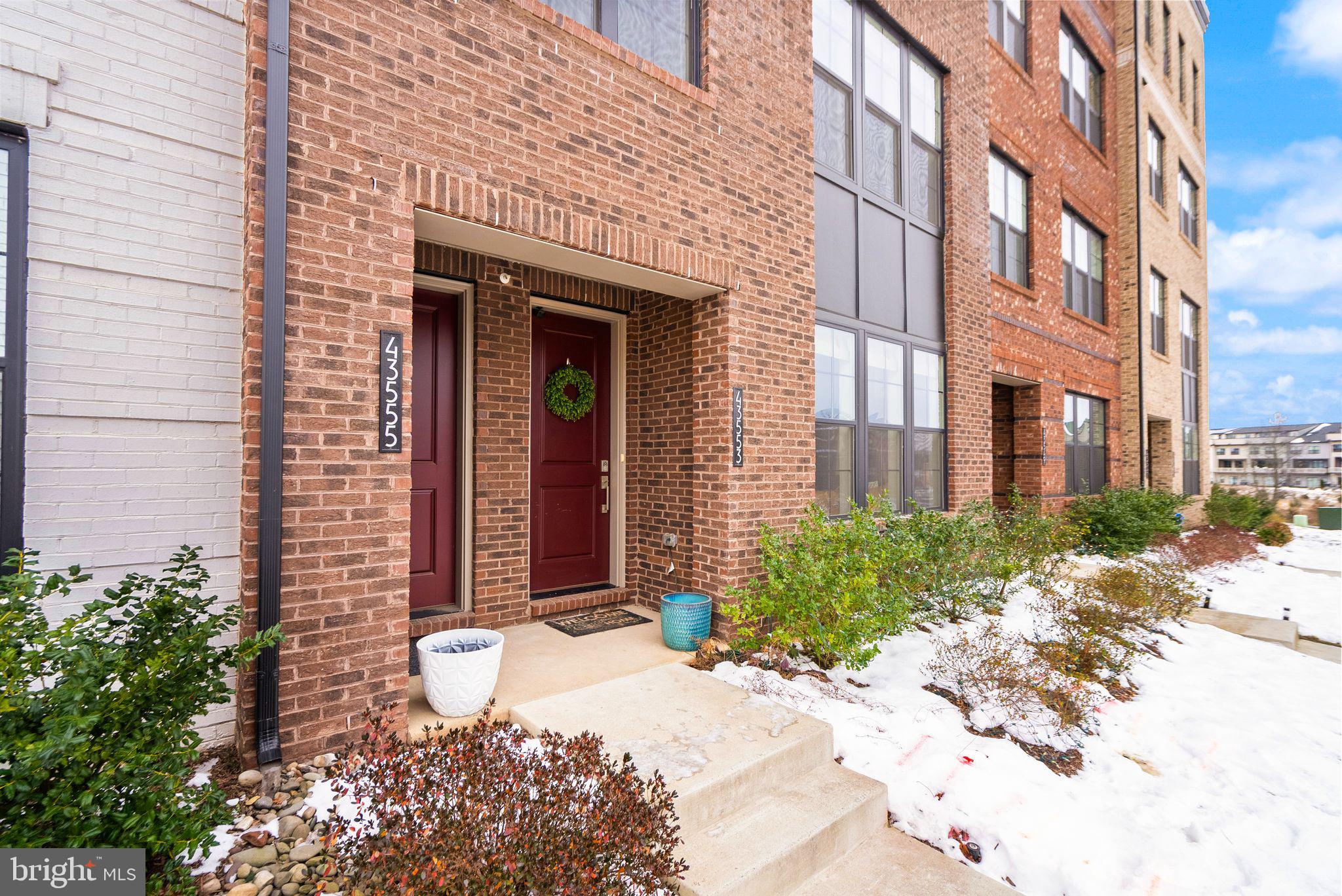 43553 Charitable Street Ashburn, VA 20148 - Photo 5 of 63 a front view of a building