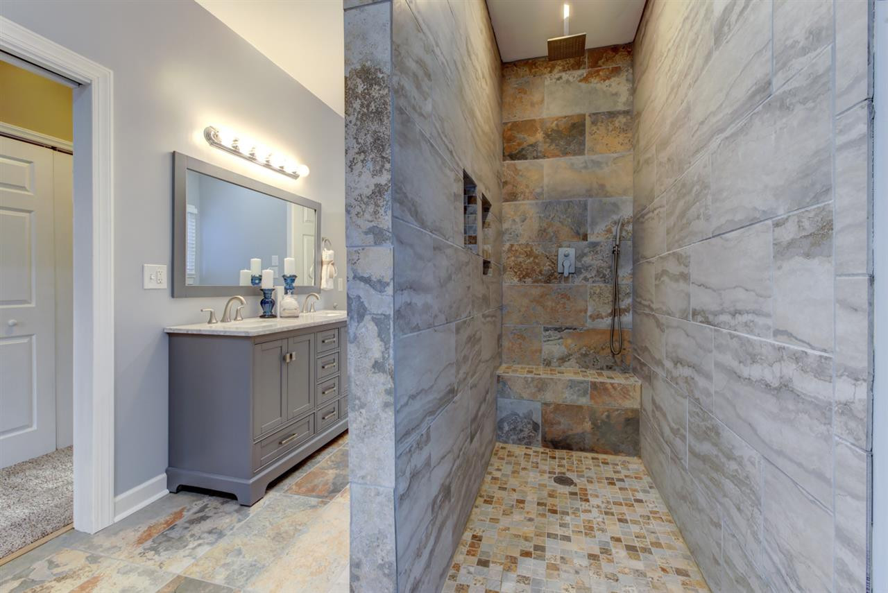 7220 Ridgeline Drive Raleigh, NC 27613 - Photo 7 of 16 Another view of the master bath, the large walk-in shower is prefect for your in-laws or for you! 1st floor Master Bath