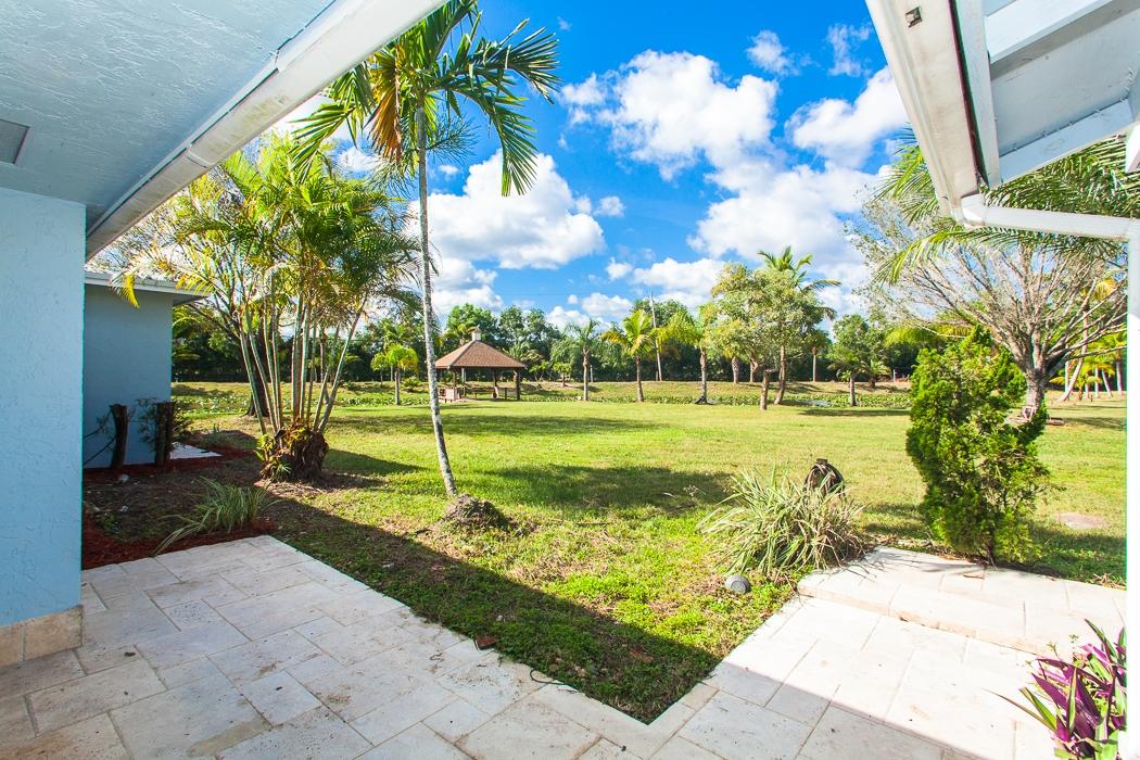 16784 Randolph Siding Road Jupiter, FL 33478 - Photo 18 of 42 Exterior Back