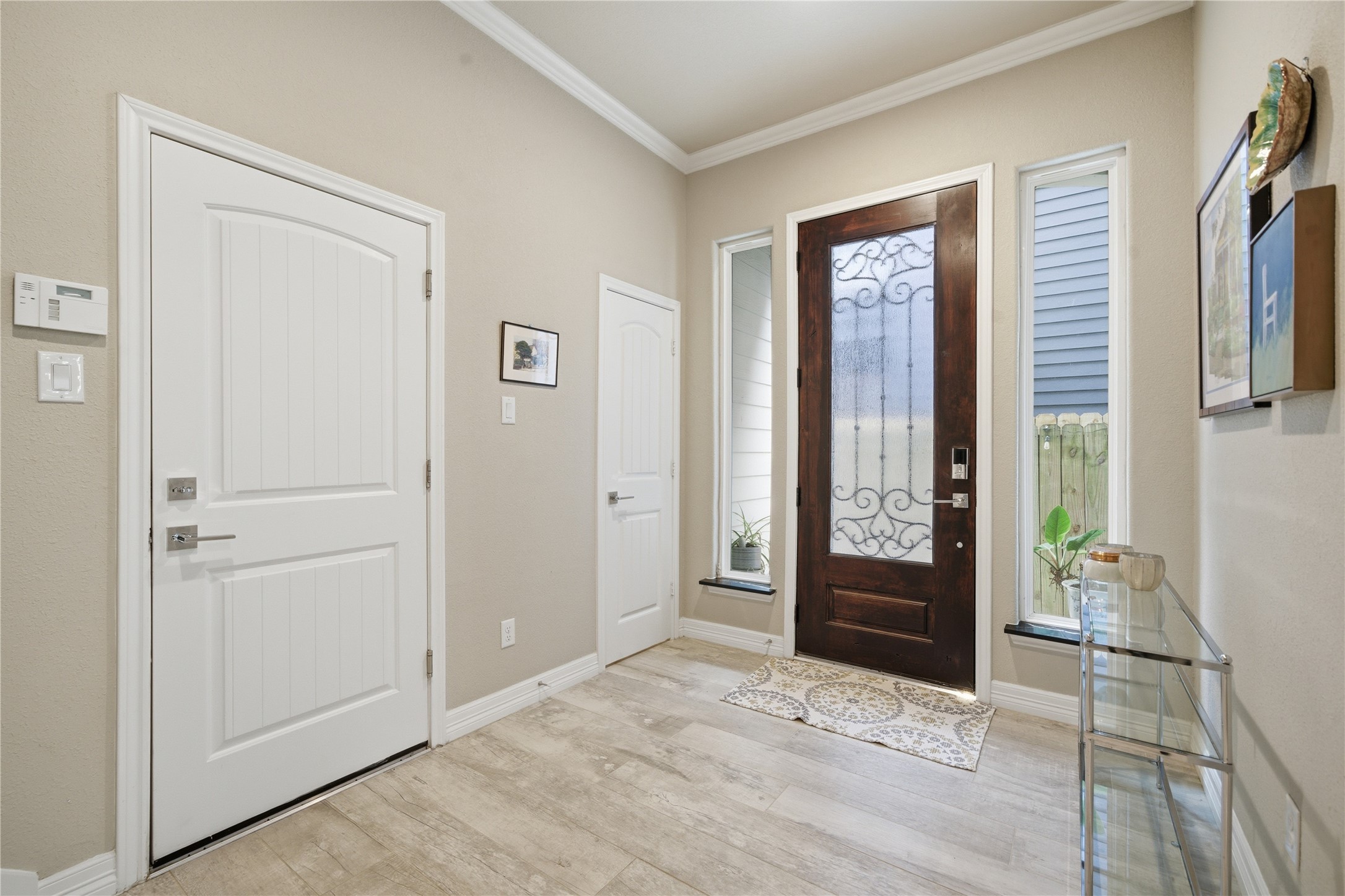 4412 New Orleans Street, Unit B Houston, TX 77020 - Photo 5 of 42 Just next to the front door, there's a door to the half bath and the door to the garage