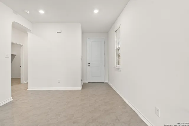 a view of a house with backyard and garden