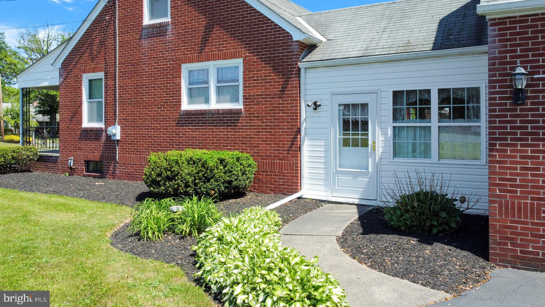 1944 Hoffmansville Road Frederick, PA 19435 - Photo 8 of 41 Sunroom Entrance