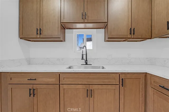 a view of room with wooden floor