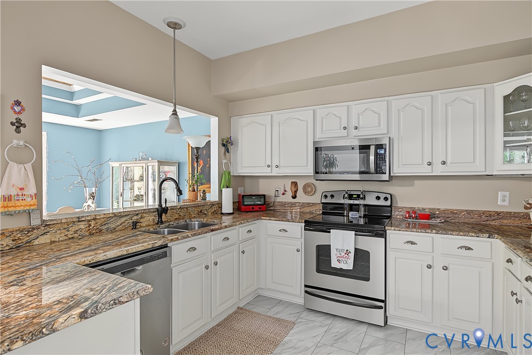3131 Stony Point Road, Unit B Richmond, VA 23235 - Photo 32 of 65 White cabinetry paired with granite countertops, s