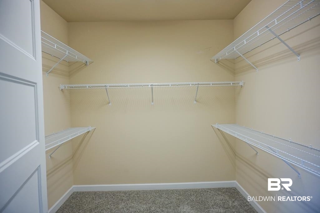 593 Begeman Road Mobile, AL 36608 - Photo 11 of 23 Spacious closet with carpet flooring