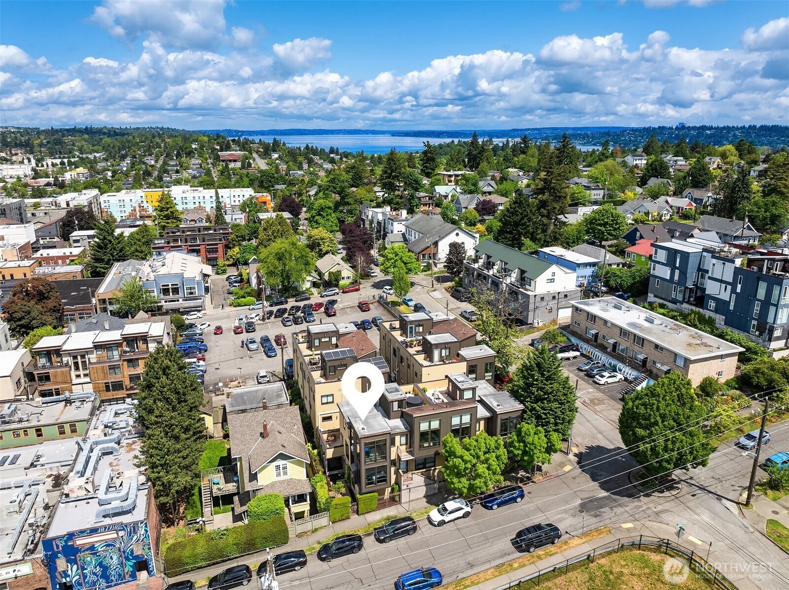 3818 South Hudson Street, Unit A Seattle, WA 98118 - Photo 1 of 31 an aerial view of residential building with outdoor space