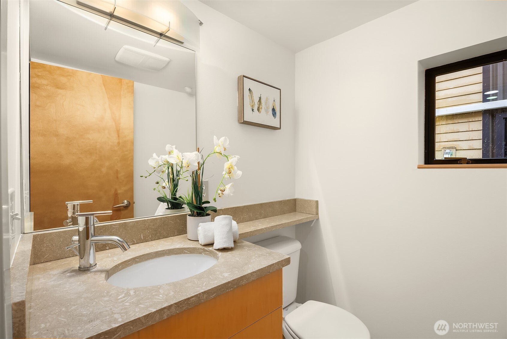 3818 South Hudson Street, Unit A Seattle, WA 98118 - Photo 13 of 31 a bathroom with a granite countertop sink and a mirror