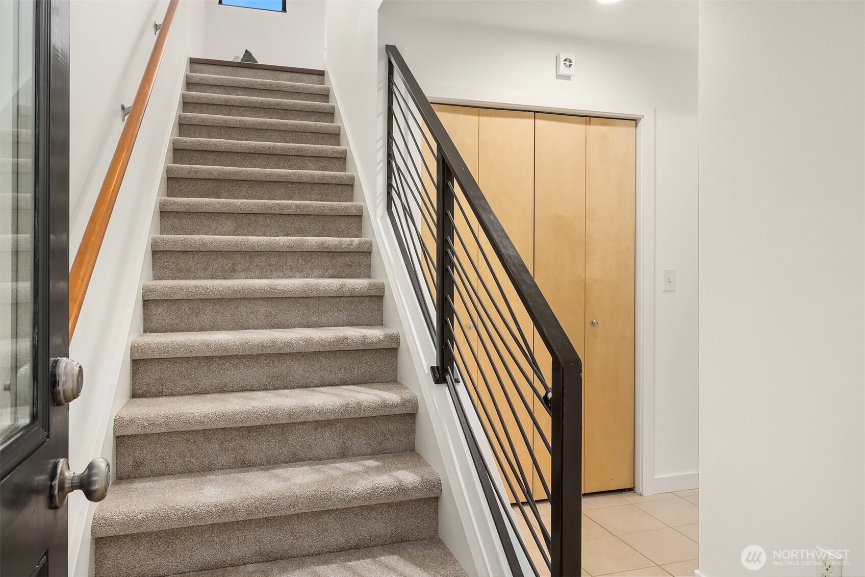 3818 South Hudson Street, Unit A Seattle, WA 98118 - Photo 6 of 31 a view of staircase with white walls
