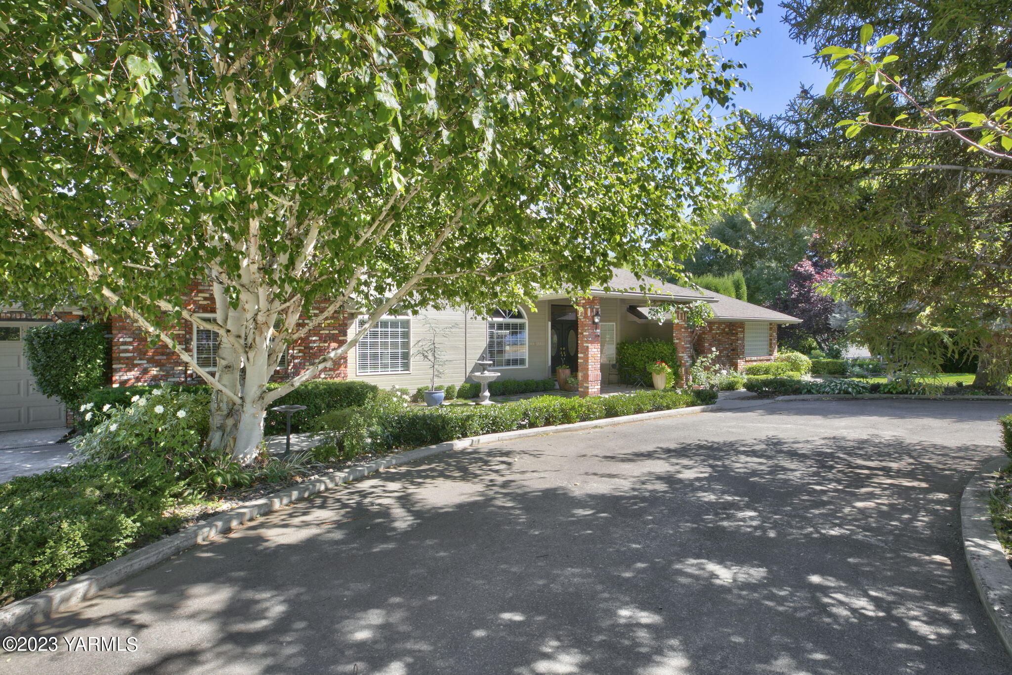 a view of a house with a street