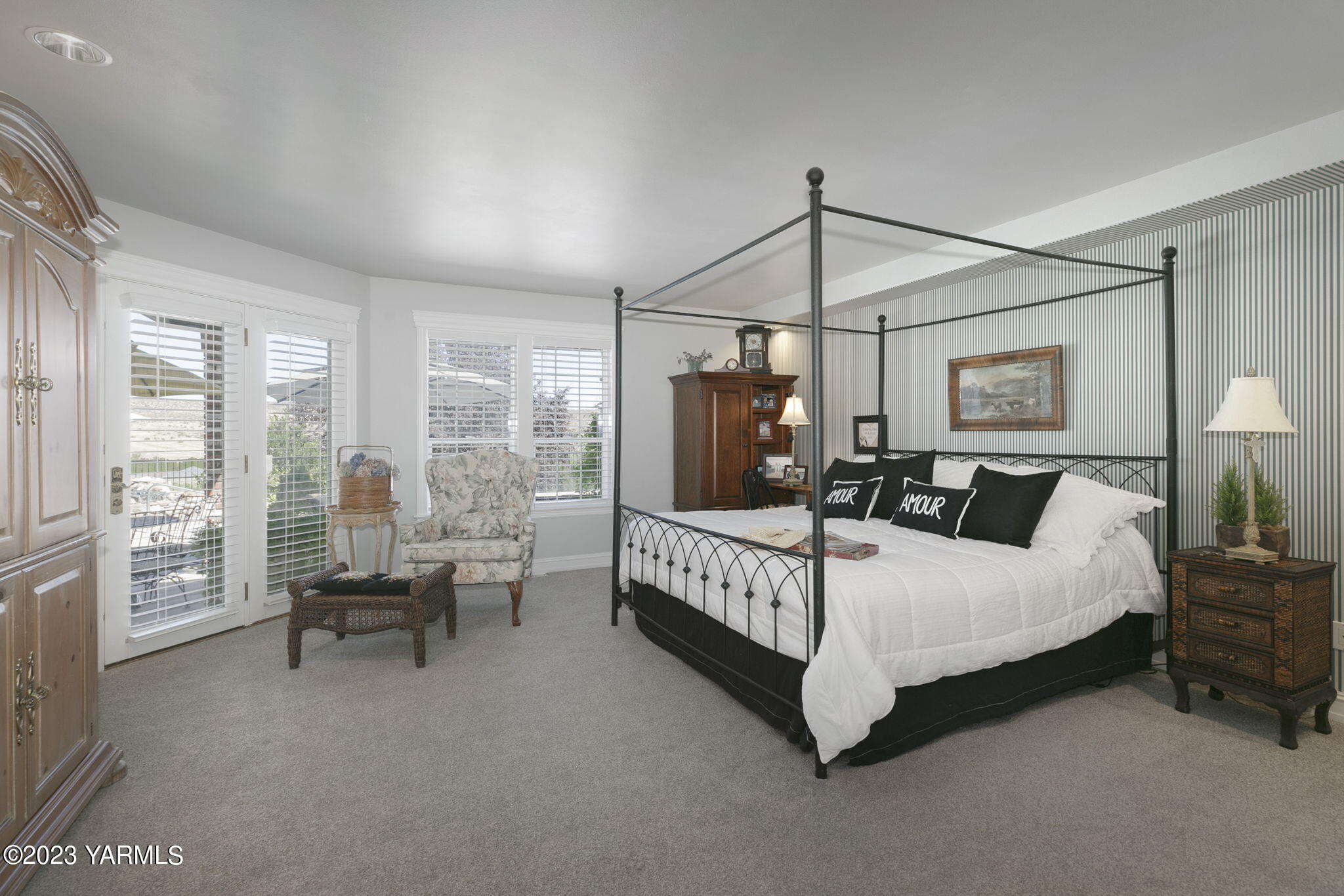 11521 Marble Extension Yakima, WA 98908 - Photo 16 of 40 a bedroom with bed and large window