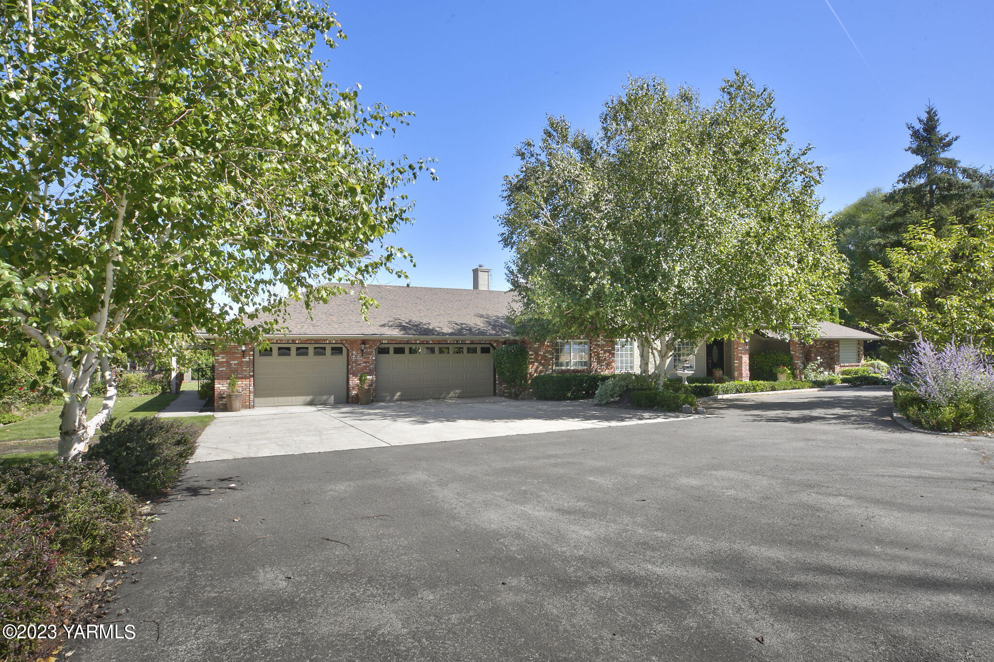 11521 Marble Extension Yakima, WA 98908 - Photo 3 of 40 a house with a tree in front of it